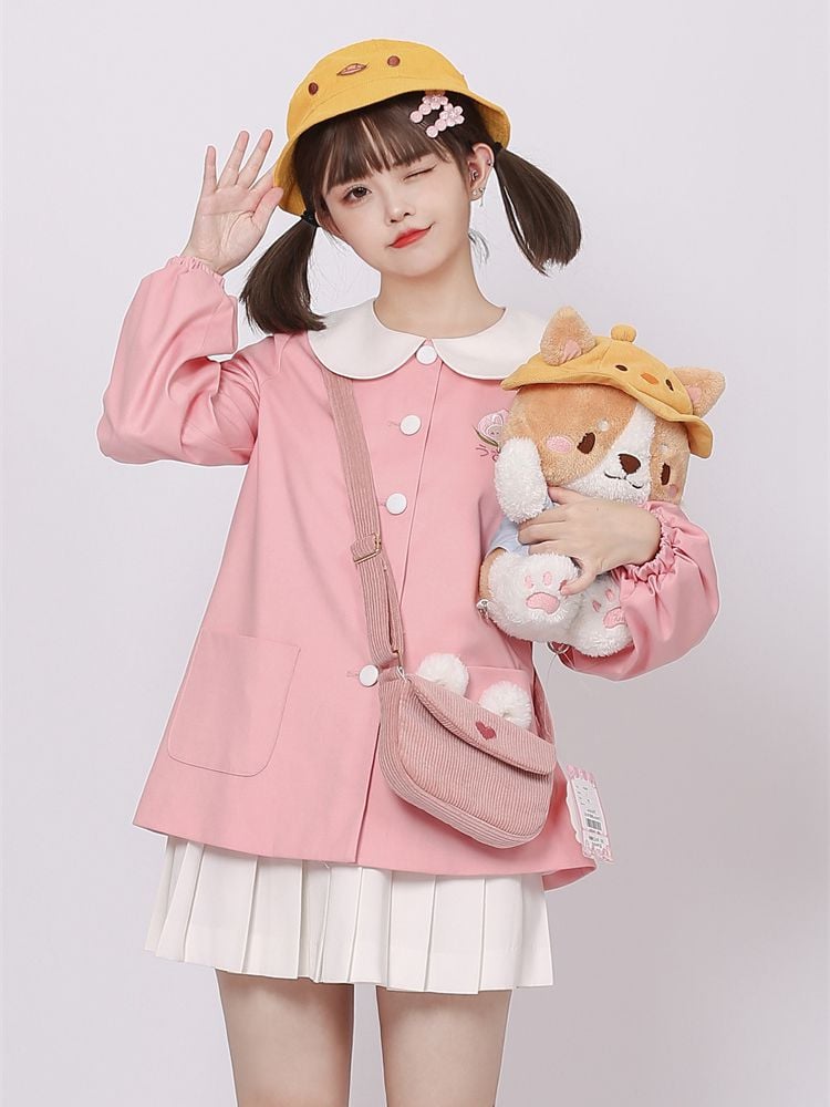 ピンクのウサギの耳のクロスボディ