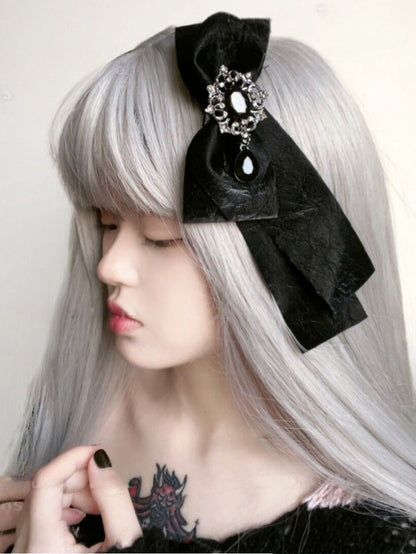 Schwarze Haarspange mit Strasssteinen und Schleife