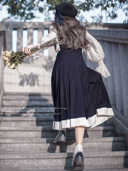 Verzierte Baskenmütze mit Schleife in Dunkelblau