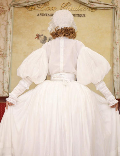 Weiße Bluse mit Lammkeulenärmeln und weißer Rock im langen Set