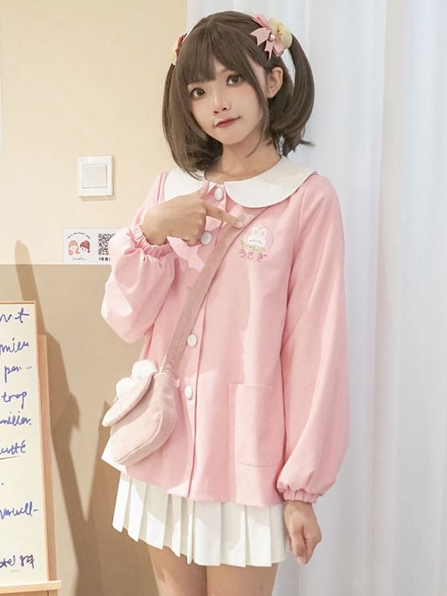 ピンクのウサギの耳のクロスボディ