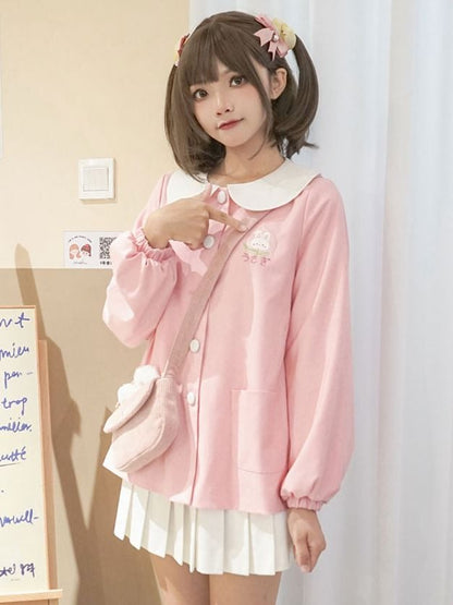 ピンクのウサギの耳のクロスボディ