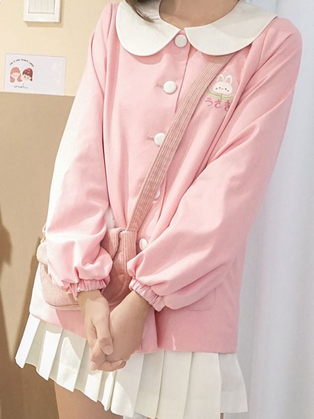 ピンクのウサギの耳のクロスボディ