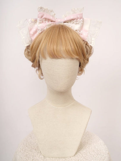 ピンク/パープルの蝶結びKC