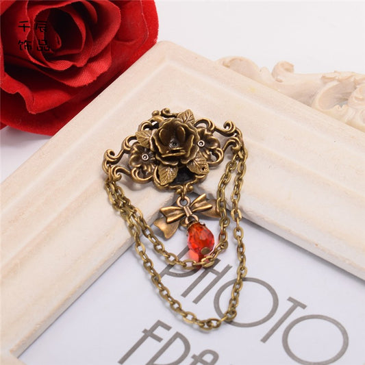 スチームパンクなリボンラインストーンローズブローチ