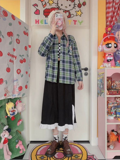 サイドウエストフリルシャーリングブラックスカートスリットトリム