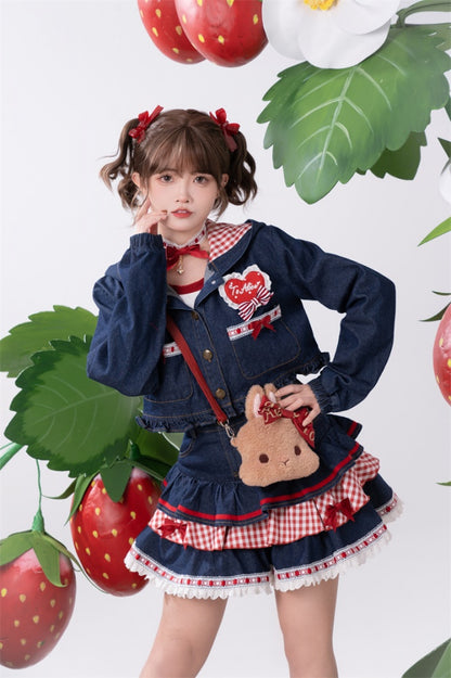 Marineblauer Spitzensaum mit Schleifenakzenten, gestufter Denim-Rock mit kariertem Patchwork